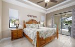 King Size Main Bedroom Suite with Pool View
